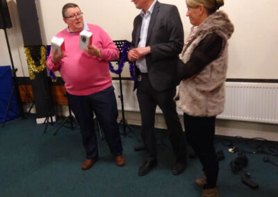 Our Chairman David Houghton presenting The Heart Rate Monitors to Dr Peter Scott. Lead Cardiologist at Royal Bolton Hospital with Kate Green from the Cardio Rehab Physio Programme keenly looking on.